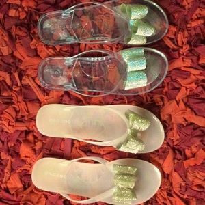 Jelly flip flops, 2 pairs. Never worn, super fun.
